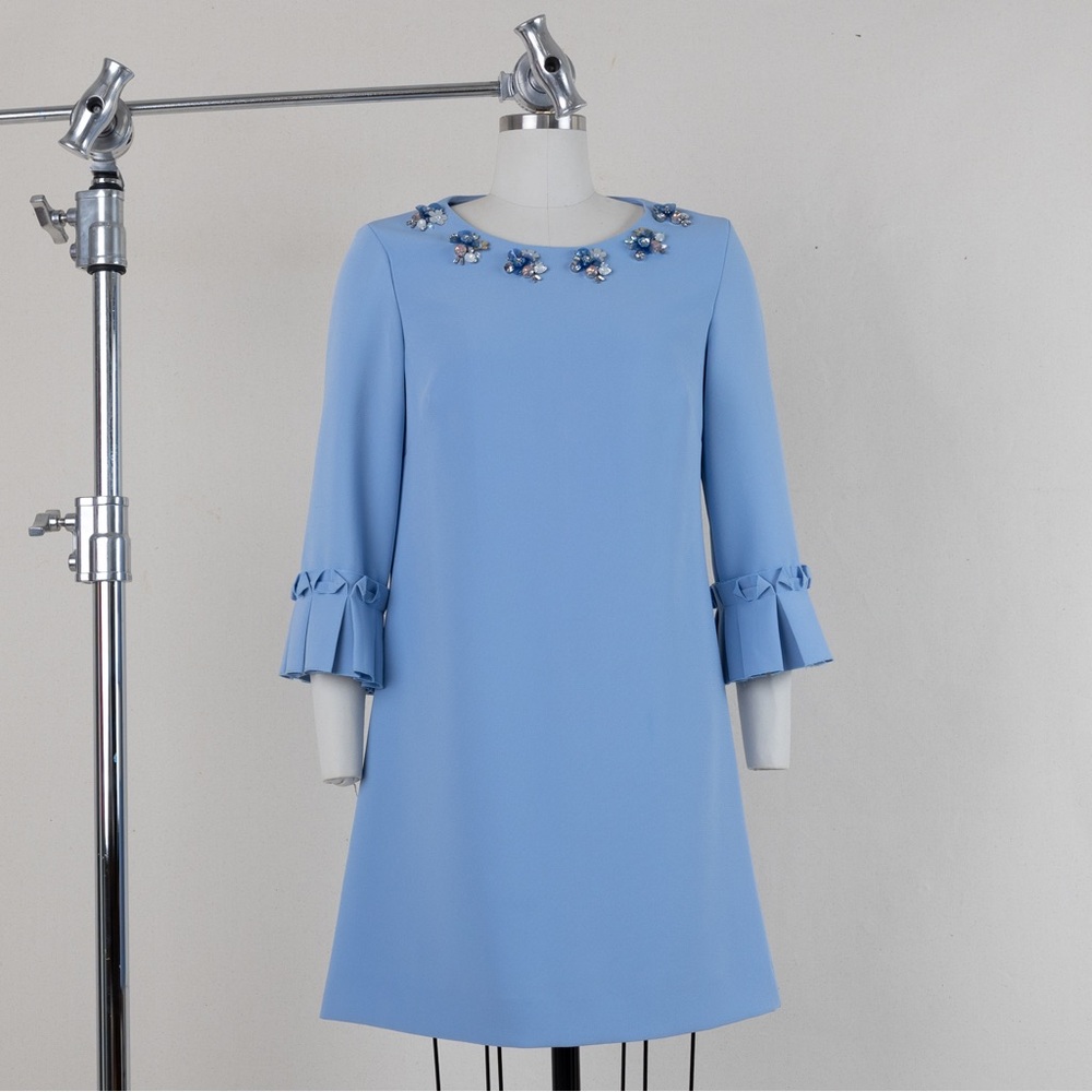 Elegant Blue Dress with Embellished Neckline